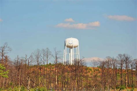 The Smiley Face Water Tower On Texas 71 In Bastrop Looks Out Over