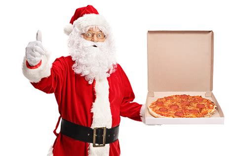 Santa Claus Holding A Pizza Box And Making A Thumb Up Sign Stock Photo