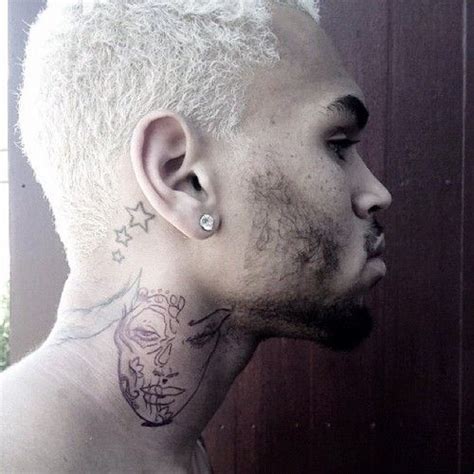 Chris brown's new tattoo is not an image of rihanna or an abused woman, his publicist told ew. Chris Brown is Getting a New Neck Tattoo of a Woman's Face ...