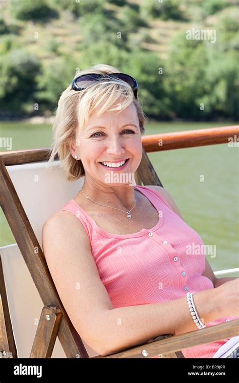 Mature Woman On A Boat Holiday Stock Photo Alamy