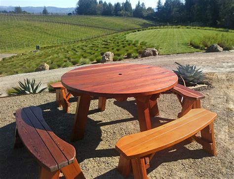 Maybe you would like to learn more about one of these? Round Wooden Picnic Table with Detached Benches