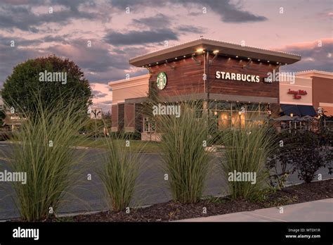 New Hartford, NY - SEPTEMBER 09, 2019: Exterior Night View of Starbucks