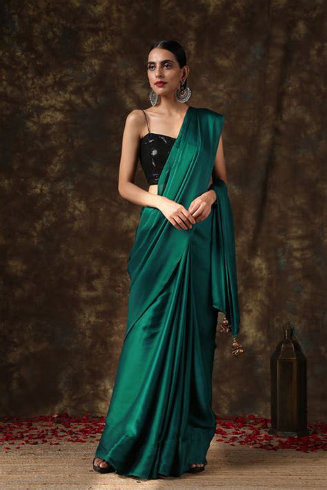 Rich Emerald Green Satin Saree With Bronze Pendants Swtantra