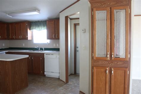 The upper cabinets in your mobile home should make sure that the addition of kitchen cabinets will not affect flooring or walls and weaken them while renovating your mobile home. Mobile Home Cabinet Makeover - Re-Fabbed
