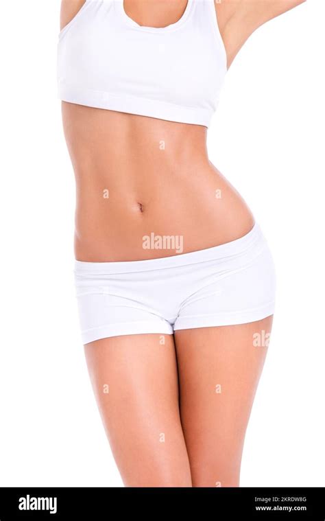 Fit Form Studio Shot Of A Fit Womans Midsection Isolated On White Stock Photo Alamy