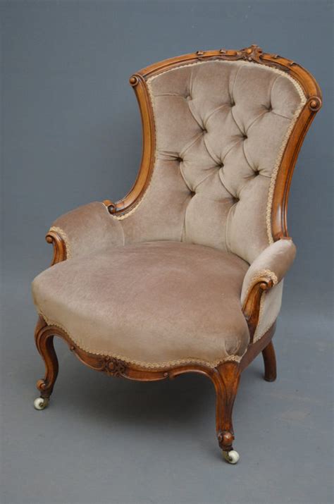 Victorian mahogany frame armchair, upholstered in cream satin damask with button back, sprung seat on turned legs. Victorian Armchair - Antiques Atlas