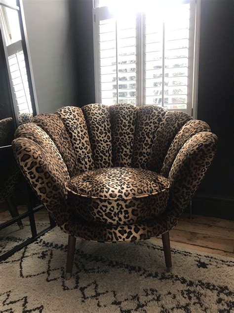 These faux leopard print bench seats are quite attractive, and are a definite way to splash some intrigue into your home decor. The Oyster Chair | Leopard print decor, Leopard print ...