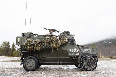 A Foxhound Armoured Vehicle Carrying Members Of The British Army