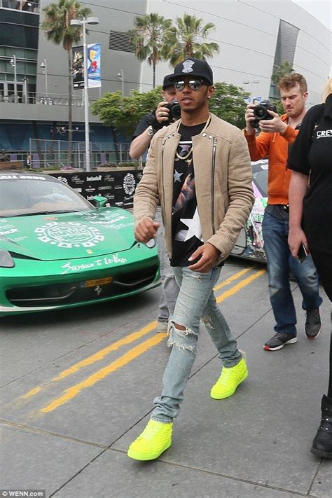 What caused lewis hamilton to be so upset? Lewis Hamilton dons neon green trainers as he steps out in ...