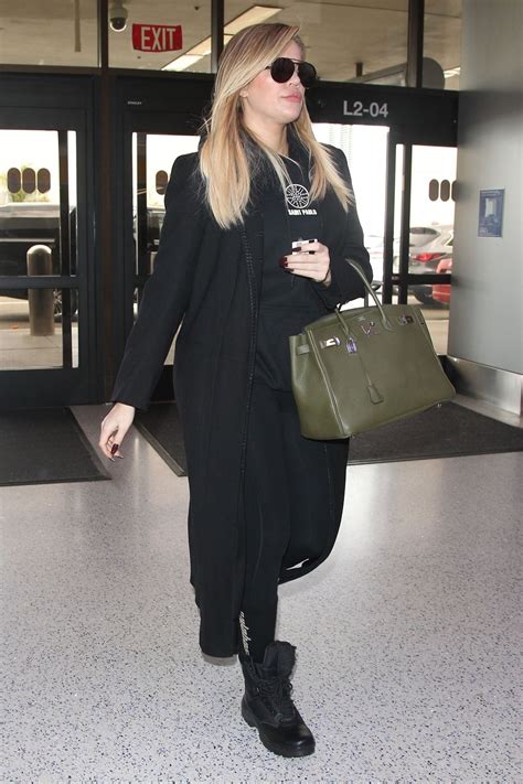 Khloe Kardashian In Travel Outfit Lax Airport 11152017 • Celebmafia
