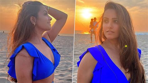 anita hassanandani looks sizzling hot in her ruffle shoulder push up bikini set view pics 👗