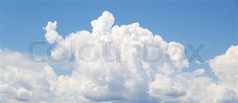 White Cumulus Clouds Formation In Blue Stock Image Colourbox