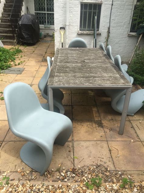 Ideal for outdoor and indoor use, the panton has all the bases covered. 6 Vitra Panton chairs and garden table. Great price ...