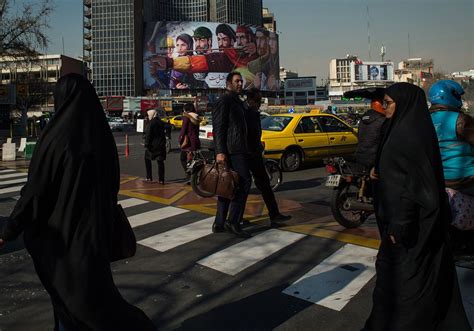 here s why some iranian women are taking off their headscarves and hanging them on a stick