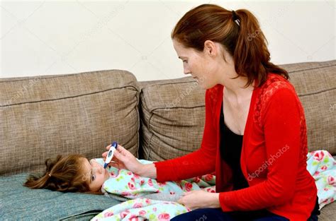 Caring Mother Taking Care Of Her Ill Girl Child — Stock Photo