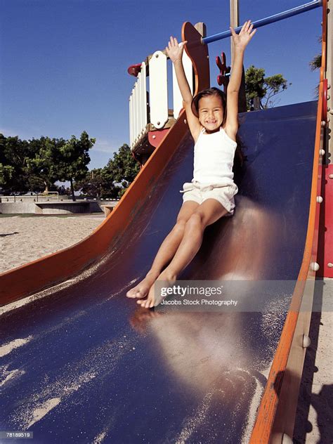 Girl On Slide High Res Stock Photo Getty Images