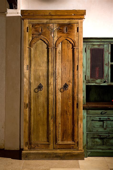 Poplar wood has a fine texture, is lightweight, mills, sands, and drills beautifully. Custom Pantry Cabinet - La Puerta Originals