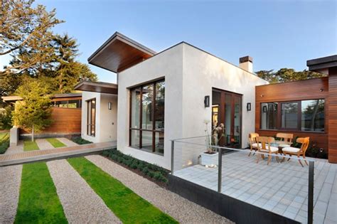 Contemporary Green Home Charms With Sleek Pool And Mini Golf Course