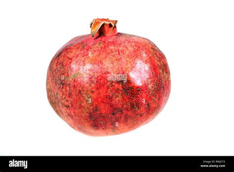 Ripe Pomegranate Isolated Over White Background Stock Photo Alamy