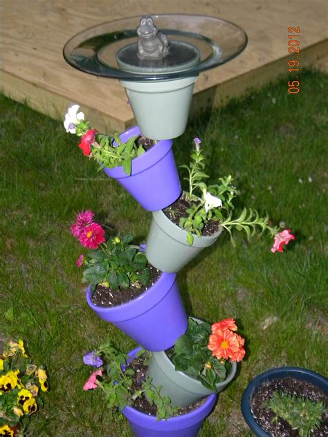 Purple & Green flower pots stacked w/ bird bath | Green flower pots, Cheap flower pots, Flower pots