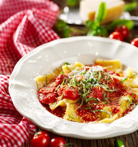 Ravioli Topped With Tomato Sauce Grana Padano Cheese And The Fresh