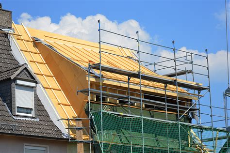 It's false.nothing behind it or in it. Shingle dormer addition to home