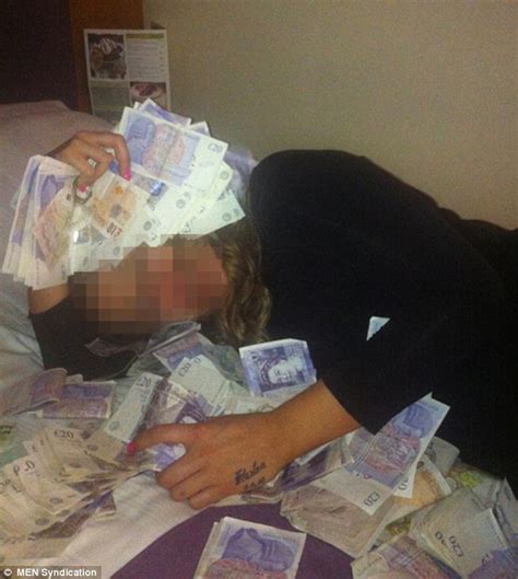 Girlfriend Of Jailed Drug Dealer Pictured Covering Herself In Piles Of