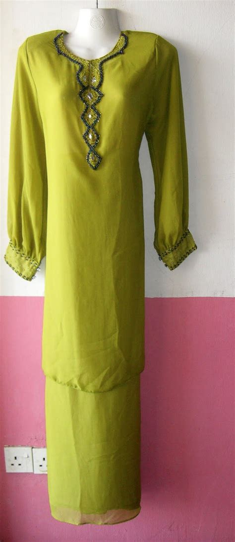 Dan ditangan kain pleated kembang payung w/a : izmin's Collection: Baju Kurung moden Eksklusif 2