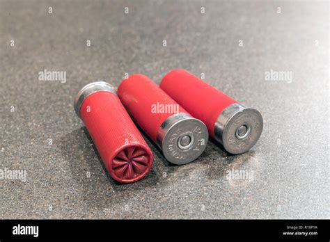 Shotgun Shells And Ammo 12 Gauge Isolated On Black Table Stock Photo Alamy