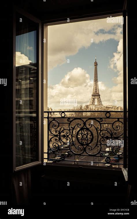 The Eiffel Tower Paris France Viewed Through An Open Window Stock