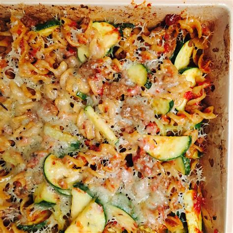 Baked zucchini and yellow squash come together in this gorgeous side dish loaded with feta and parmesan cheese. Baked Pasta with Peppers, Zucchini and Sausage - Fresh ...