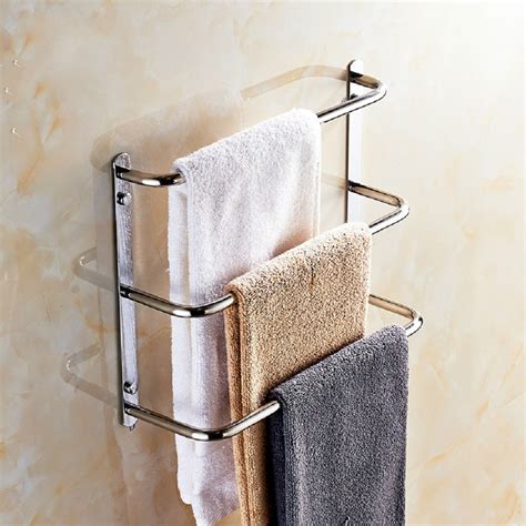 What type of hotel towel rack that is used in the bathroom? Wall Mounted Stainless Steel 3 Layers Towel Shelf Mirror ...