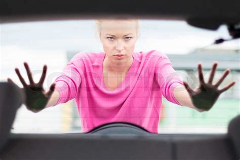 Woman Pushing A Car Stock Image Colourbox