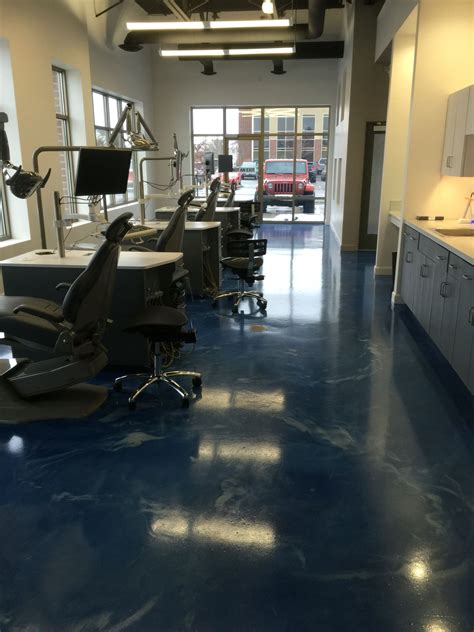 Metallic epoxy floor installed for a Dental office by Sierra Concrete Arts