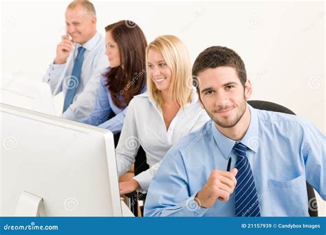 Business Team Happy Sit In Line Behind Table Stock Image Image Of