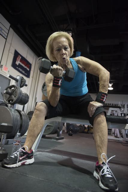 joan schmidt a 76 year old powerlifter uses free weights at iron addicts lv in las vegas