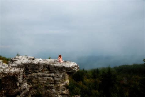 Model On Rocks Outdoors In The Fog Posing Nude And Topless