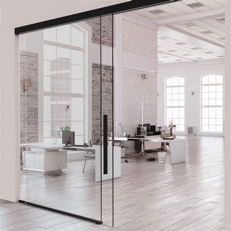 Promoting Employee Interaction 4 Reasons Why Frameless Glass Wall Systems Are A Great Fit For