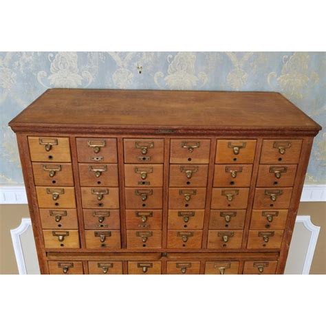 Cabinet made of tkphk board covered with mica hanging type. Vintage Quartered Oak Gaylord Bros. Inc 60 Drawer Library ...