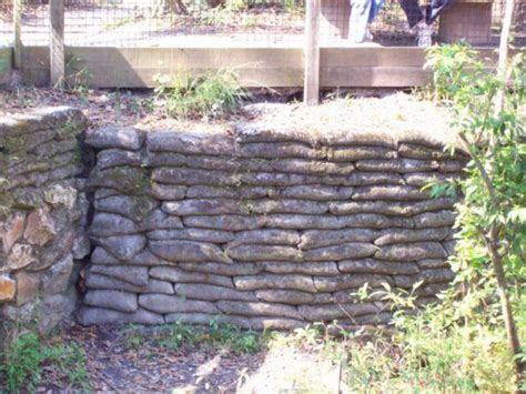 This is no way an engineered wall! concrete bag wall | Concrete bags, Stone walls garden ...