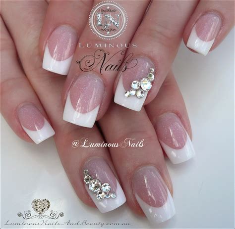 This beautiful silver metal hair comb is made with a large rhinestone and pearl embellishments. Bridal Nail Ideas!