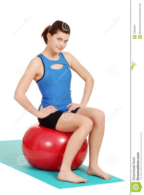 Brunette Woman Smiling Sitting On Exercise Ball Stock