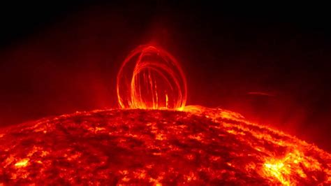 It still has about 5,000,000,000—five billion—years to go. NASA SDO - Fiery Looping Rain on the Sun - YouTube