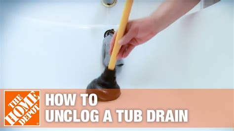 Sometimes, a small bar of soap or a child's toy becomes wedged in. How to Unclog a Tub Drain | The Home Depot - YouTube