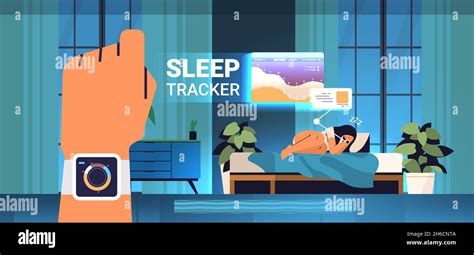 Young Woman Sleeping In Bed With Electronic Smart Watch App Tracker On