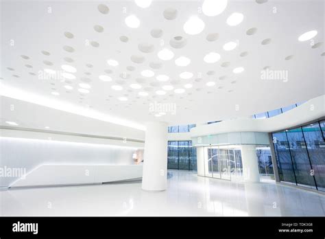 Futuristic Modern Office Building Interior In Urban City Stock Photo
