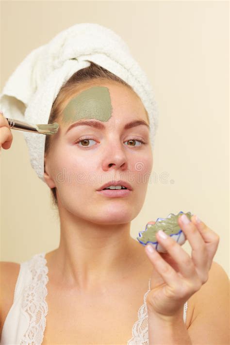 Woman Applying With Brush Clay Mud Mask To Her Face Stock Image Image Of Purifying Care