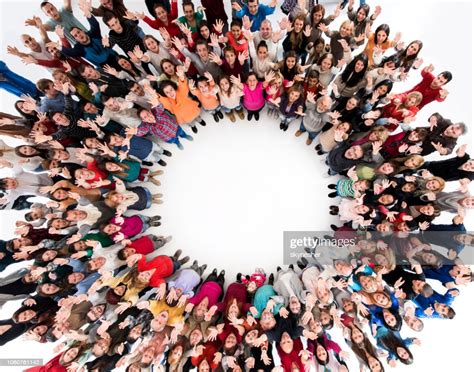 Above View Of Crowd Of People Standing In Circle With