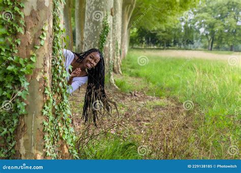 Happy Woman Hiding Behind Tree Stock Image Image Of Field Fitness