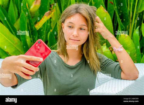 Young Girl Taking Selfie Outdoors Stock Photo Alamy